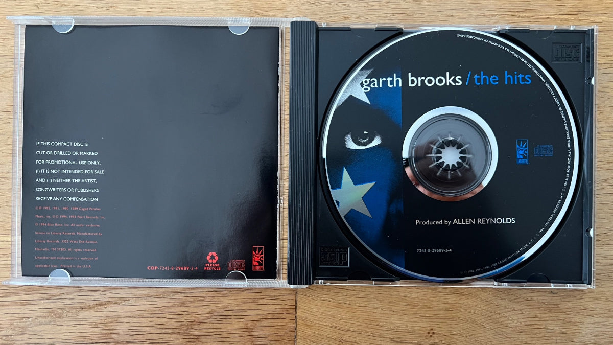 Garth Brooks - The Hits / CD - 1. US-Press. 1994 - (M-/M-)
