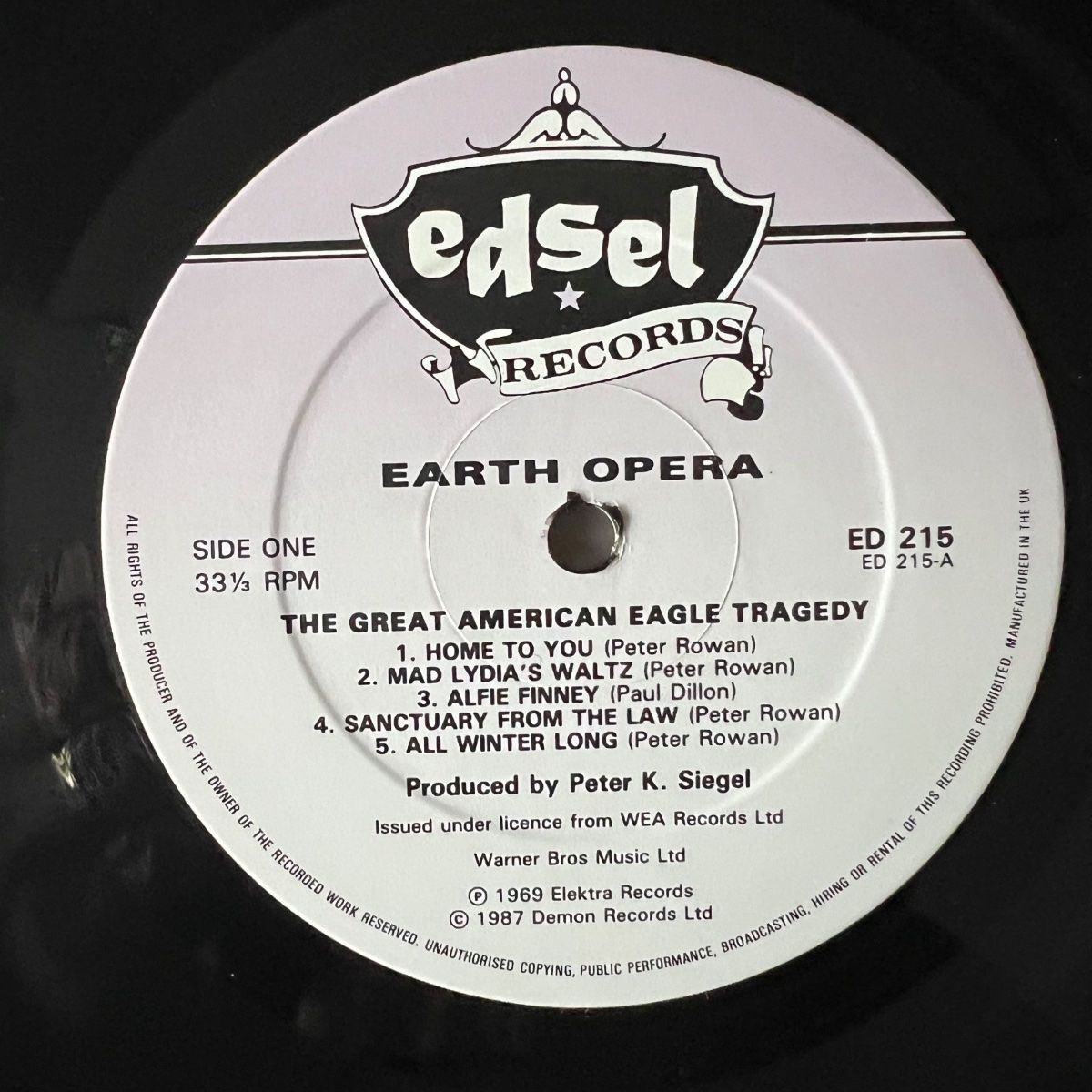 Earth Opera - La Grande Tragédie de l'Aigle Américain / Presses britanniques. RE 1987 - (M-/M-)