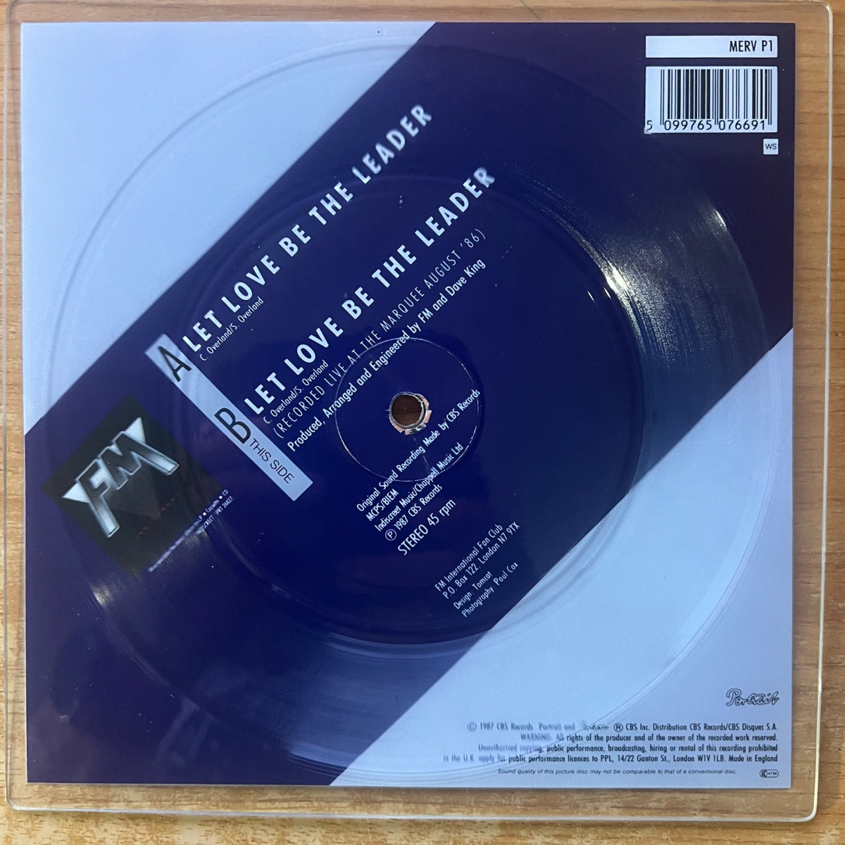 FM - Let Love Be The Leader / 45 tours picture disc - Première édition britannique. 1987 - (Très bon état / Pochette originale en plastique)