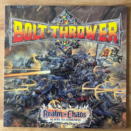 Bolt Thrower - Royaume du Chaos / 1re édition britannique. 1989 - (M-/M-)