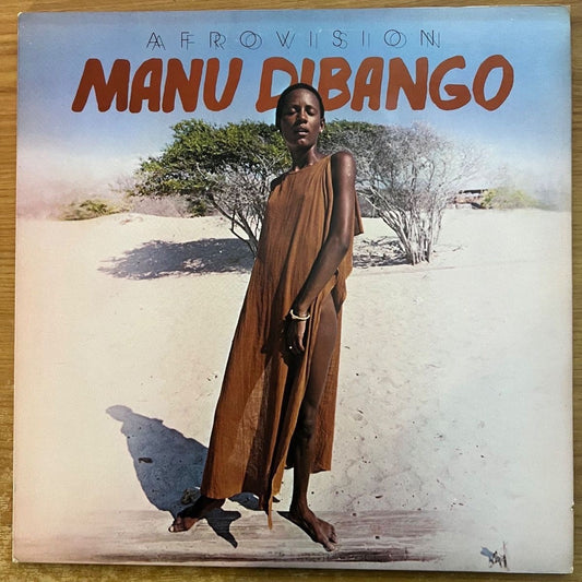 Manu Dibango - Afrovision / 1. UK Press. 1976 - (M-/M-)