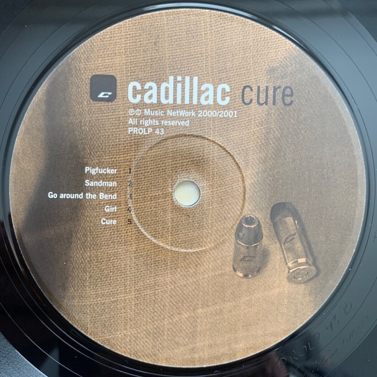Cadillac - Cure / 1. Presses norvégiennes. 2001 - (M-/M-)